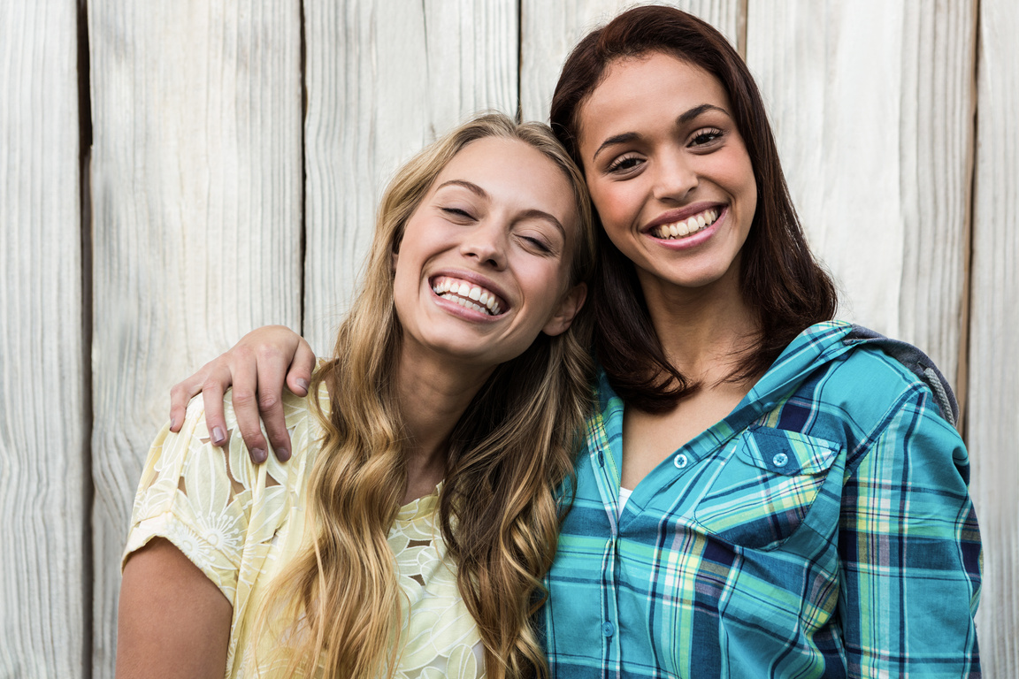Two friends smiling